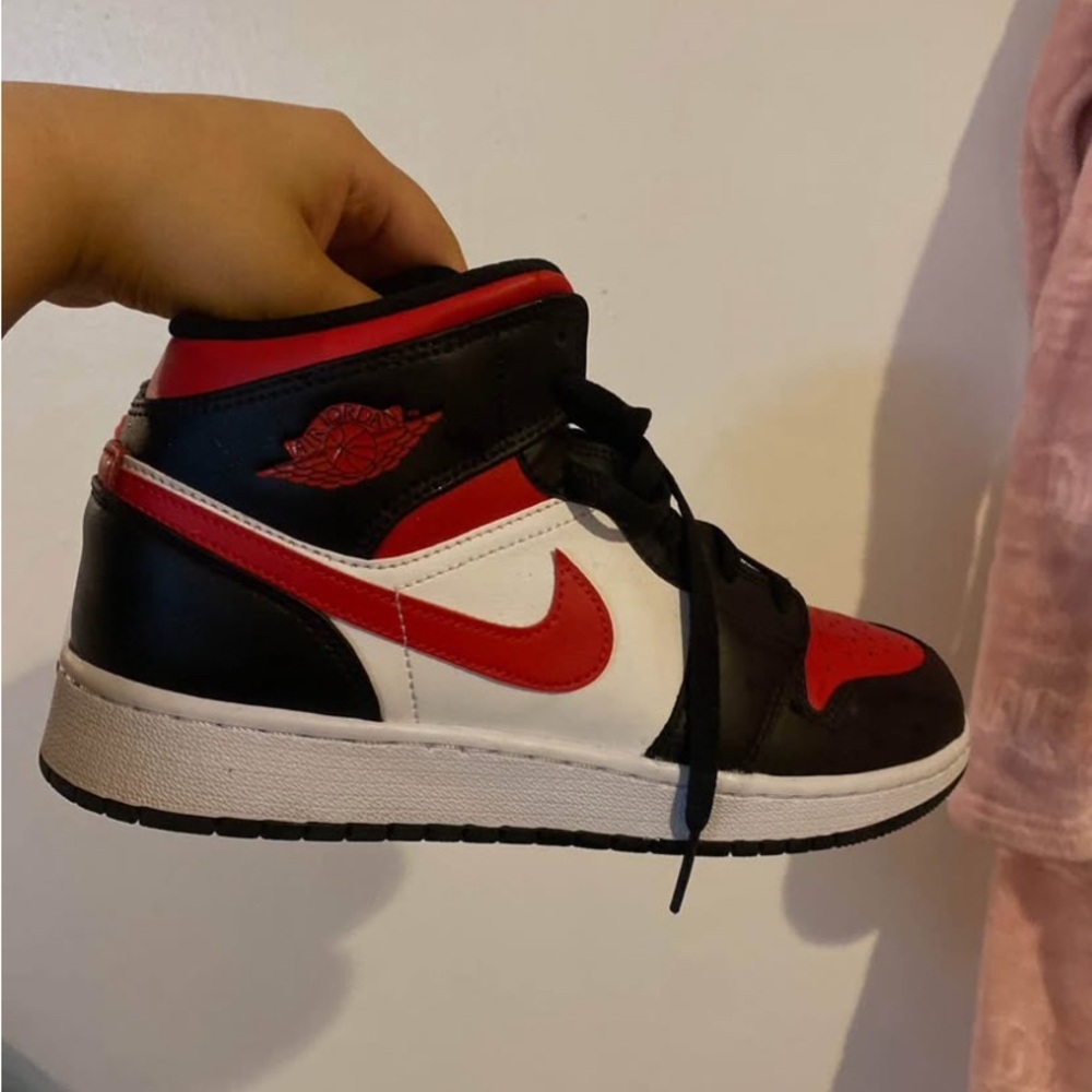 Nike Air Jordan Black, Red, and White Sneakers